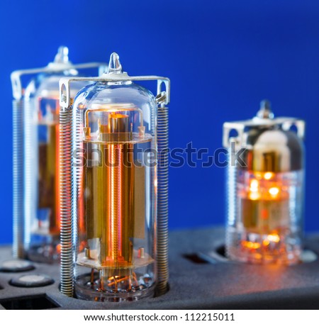 Three vacuum electron tubes