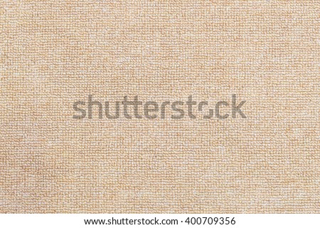 Close-up of the light brown carpet texture background in the meeting room.