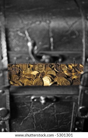 Treasure chest in black and white, with gold coins peaking through from inside