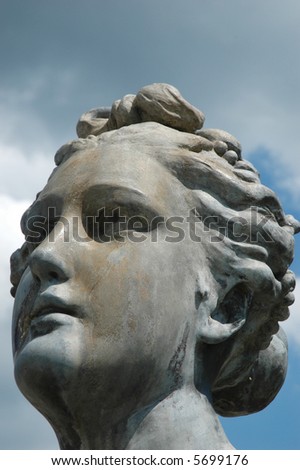 Close up of a statue with sad or lost expression in eyes