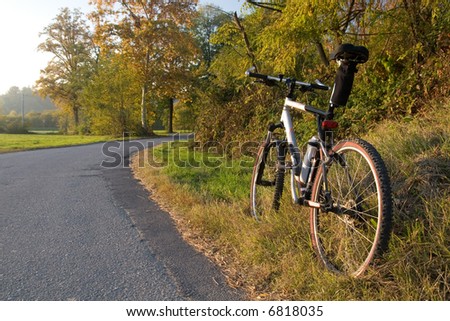 The road and mountain bike in afternoon lighting