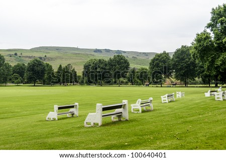 Benches at the cricket field of Michael House in KZN