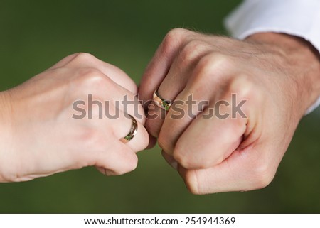 Wedding Rings on Spouses Hands