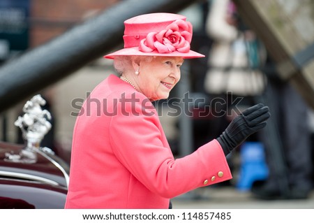 LIVERPOOL, ENGLAND - MAY 17 2012: Her Royal Highness Queen Elizabeth II visits Liverpool Albert Dock during her Diamond Jubilee tour of Great Britain, Liverpool, England. May 17 2012