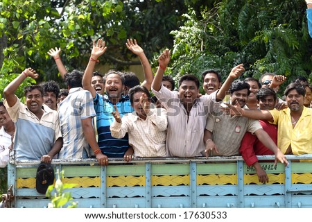 CALCUTTA, INDIA - JUNE 15: a group of hindu people riding the then political meeting June 15, 2008 in Calcutta, India