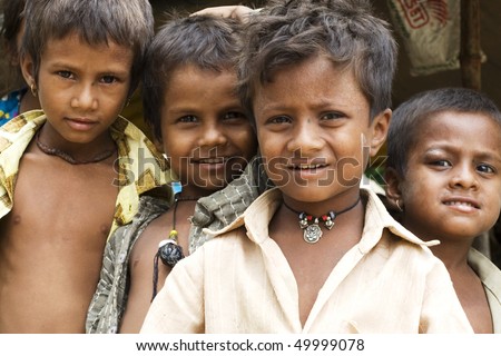 AGRA, INDIA - JUNE 19: Portrait of tribal children in a village in india, from Agra June 19, 2008 in Agra, India.