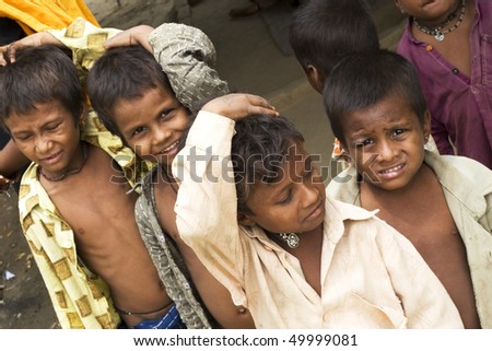 AGRA, INDIA - JUNE 19: Portrait of tribal children in a village in india, from Agra June 19, 2008 in Agra, India.