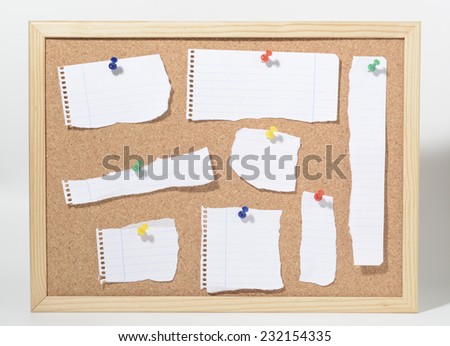Cork board and paper scraps