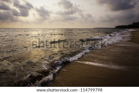 Kannur, Keral, India. Sunset on Thottada Beach, 1km south of Kannur in Kerala, south India.