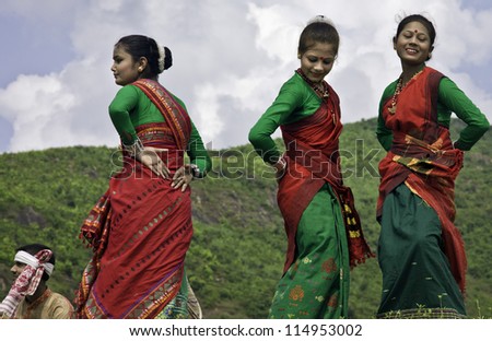 GUWAHATI - SEPTEMBER 28: unidentified dancers perform cultural dance in the hills on September 28, 2011 near the city of Guwahati, Assam, India.