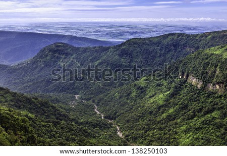 Cherrapunjee, Meghalaya, India. View of the Khasi Hill with thick forests, deep valley gorges, and a river near the town of Cherrapunjee, the wettest place on earth, in Meghalaya, north east India.