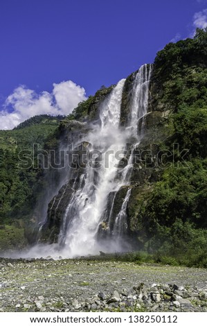 Tawang, Arunachal Pradesh, India. A high waterfall in the mountains of western Arunachal Pradesh near the town of Tawang, north east India.