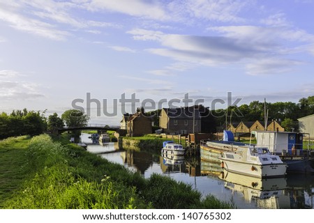 BEVERLEY, UK - JUNE 01: the weekend break at sunset brings to a halt most activity in Tickton and boating on the river Hull on June 01, 2013 near Beverley, East Riding of Yorkshire, UK.