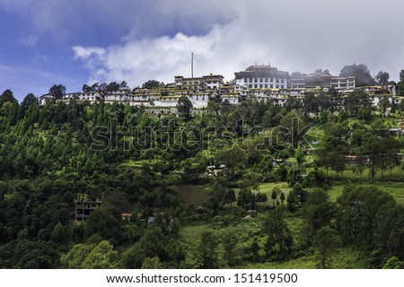 Tawang, Arunachal Pradesh, India.  The ancient 17th Century Buddhist Monastery perched on top of a high mountain overlooking the town of Tawang, western Arunachal Pradesh, north east India.