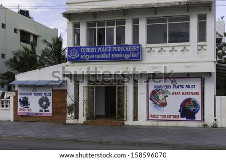 PUDUCHERRY, INDIA - NOVEMBER 18: The front elevation of the local police station with humourous hoardings advertising safety on November 18, 2012 in Puducherry, south India.