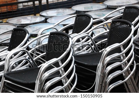 Stacks of chairs and tables