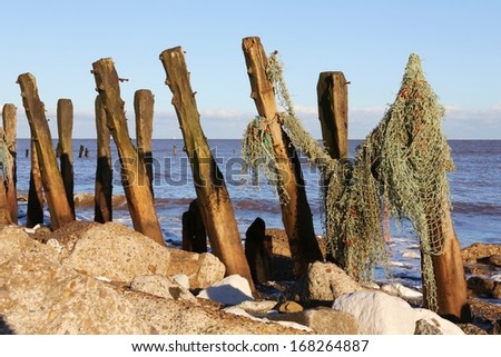 Beach groynes to avoid erosion at Spurn Point on the East Riding of Yorkshire Coast, UK