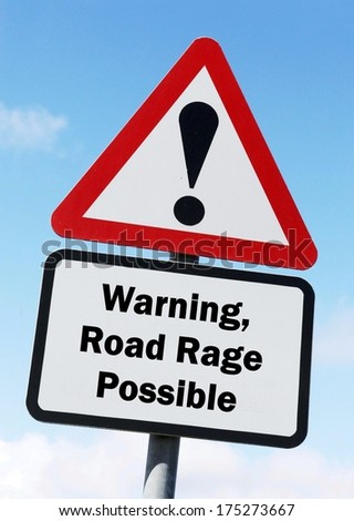 A red and white roadsign with a warning about road rage ahead concept. against a partly cloudy sky background