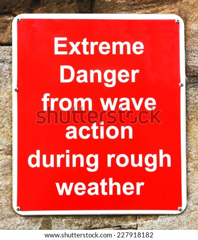 Danger from wave action in rough weather warning sign
