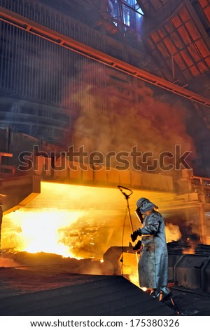 steel worker and hot steel