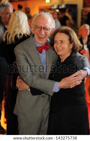 COLOGNE - GERMANY - JUNE 21, 2009: Nobel Prize winner Eric Kandel discusses with his wife at the film premiere of his documentary film \