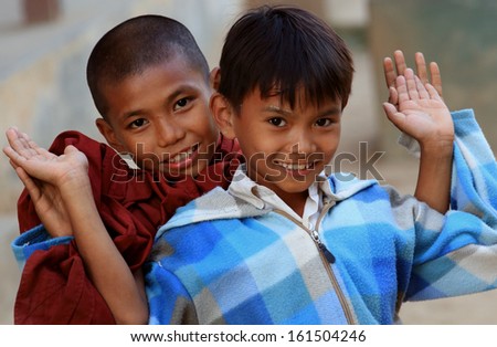 MANDALAY - MYANMAR - DECEMBER 14, 2012: Unidentified Burmese children on December 14, 2012 in Mandalay, Myanmar. In 2012 an ongoing conflict started between Buddhists and Muslims in Myanmar.