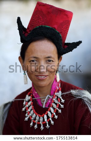LEH - INDIA - SEPTEMBER 20, 2013: Unidentified woman with traditional dress at the inaugural procession of the annual Ladakh Festival 2013 on September 20, 2013 in Leh, India.