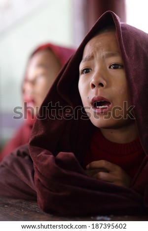 HSIPAW - MYANMAR - DECEMBER 18, 2013: An unidentified Burmese Buddhist novice on December 18, 2013 in Hsipaw, Myanmar. In 2012 an ongoing conflict started between Buddhists and Muslims in Myanmar.