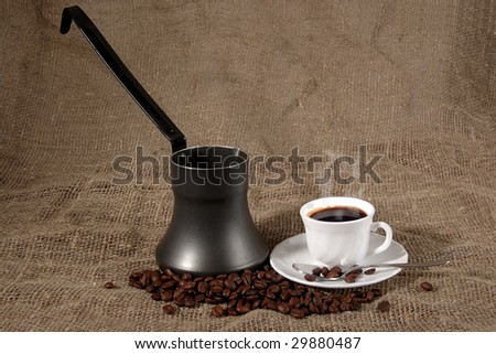 cup of coffee with smoke Grain coffee and cup for make coffee