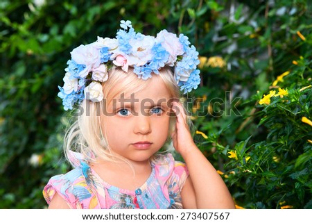 Summer girl - girl with a wreath of flowers