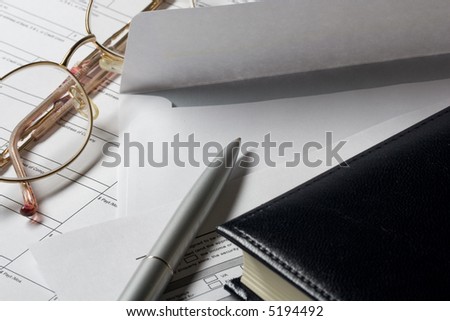 letter-cover pen and notebook glasses