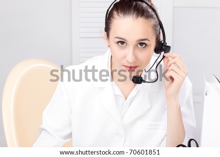 woman with headset and close up shoot over white background