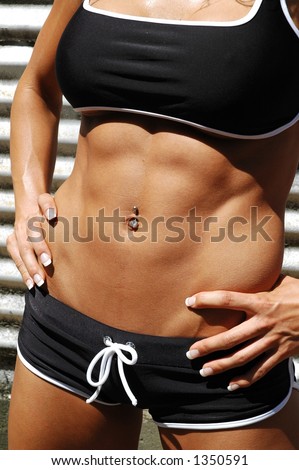6-pack abs of a female fitness model.