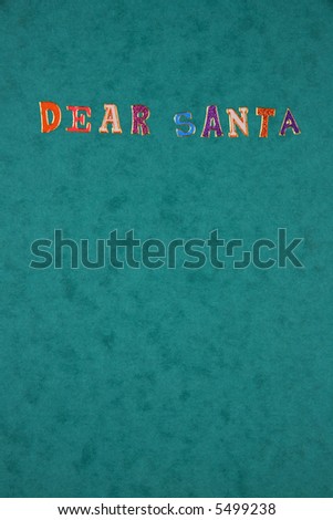 Dear Santa in funky sparkly letters on a green mottled background.
