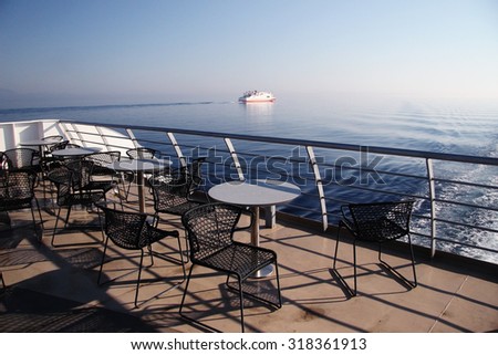 Watching the horizon from a cruise ship deck