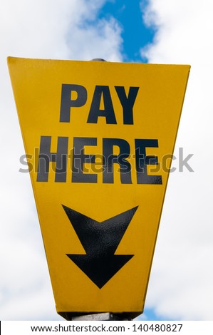 Pay here car park sign