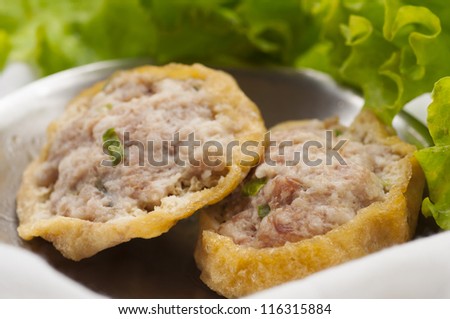 Steam pork and tofu dim sum in small plate