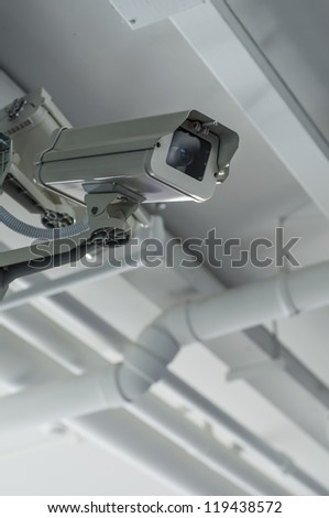 Security camera on the ceil with housing