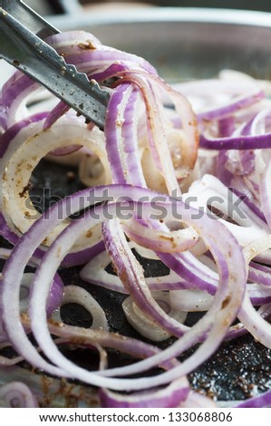 Fried red onion in korean pan