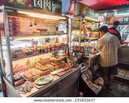 KUALA LUMPUR, MALAYSIA - NOVEMBER 14, 2014 :  Local foods in Chinatown Street restaurant . Chinatown is very popular with tourists and locals.