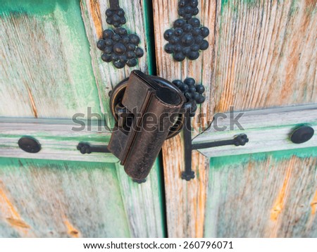 Old rusty lock on the wooden gate, Korea tradition style.