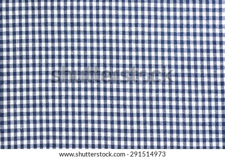 Blue checked clothes fabric texture background.