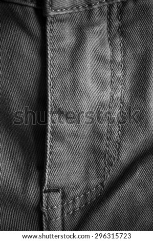 Black denim jeans on white background