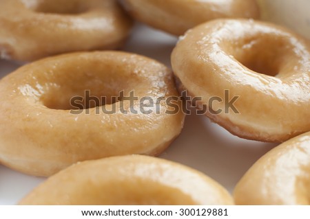 Glazed donuts in box