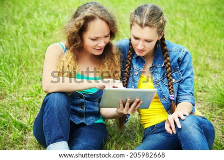 two friends with tablet computer.  youth lifestyle