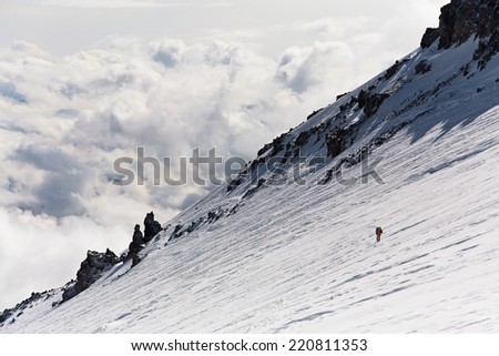 hiker in the mountain. Climb to the top. mountaineering