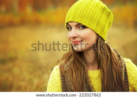 outdoor closeup portrait of a beautiful brunette middle aged woman