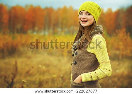 outdoor portrait of a beautiful brunette middle aged woman