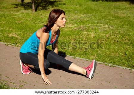sporty athletic woman on a grass background. outdoor sports. healthy sport lifestyle. fitness, yoga