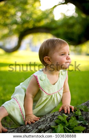 Pensive child on an old water oak tree.